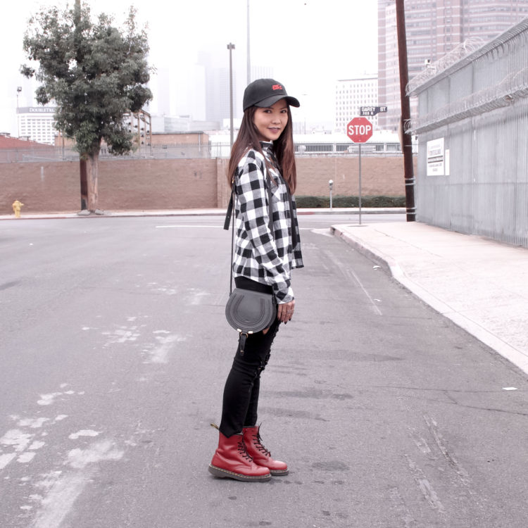 girl wearing red doc martens